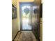 Elegant entryway with decorative door and wrought iron screen at 20811 E Excelsior Ave, Queen Creek, AZ 85142