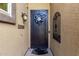 Ornate front door with a decorative wreath and metal accents at 20811 E Excelsior Ave, Queen Creek, AZ 85142