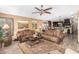 Open living room with kitchen views and comfortable seating at 20811 E Excelsior Ave, Queen Creek, AZ 85142