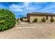 Landscaped side yard with brick steps leading to the house entrance at 20811 E Excelsior Ave, Queen Creek, AZ 85142