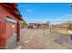 Pathway leads to a rustic shed and horse stables at 21930 W Rancho Del Oro Dr, Wittmann, AZ 85361