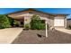 Close-up of a charming single-story home with a well-maintained front yard at 2233 N Middlecoff Dr, Mesa, AZ 85215