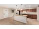 Kitchen with granite countertops, stainless steel appliances, and a center island at 2233 N Middlecoff Dr, Mesa, AZ 85215