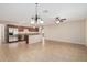 Spacious kitchen boasting stainless steel appliances, granite countertops and center island at 2233 N Middlecoff Dr, Mesa, AZ 85215