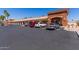Exterior view of the library with parking and landscaping at 2233 N Middlecoff Dr, Mesa, AZ 85215