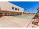 Shuffleboard courts with benches and a clubhouse in the background at 2233 N Middlecoff Dr, Mesa, AZ 85215