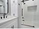 Clean bathroom with white cabinets, subway tile, and a bathtub at 23807 N 64Th Ave, Glendale, AZ 85310