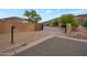 Private gated entrance to the community with a keypad at 23807 N 64Th Ave, Glendale, AZ 85310