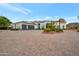 Home exterior showcasing a three-car garage and solar panels at 23807 N 64Th Ave, Glendale, AZ 85310
