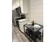 Eat-in kitchen with quartz countertops and stainless appliances at 23807 N 64Th Ave, Glendale, AZ 85310