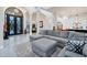 Open living space with a large sectional sofa and kitchen views at 23807 N 64Th Ave, Glendale, AZ 85310