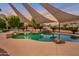 Inviting pool area with shade sails and a relaxing atmosphere at 23807 N 64Th Ave, Glendale, AZ 85310
