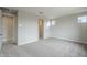Bedroom with carpet, a closet, and windows at 24177 W Hilton Ave, Buckeye, AZ 85326