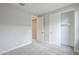 Bedroom with carpet, windows and doorway at 24177 W Hilton Ave, Buckeye, AZ 85326