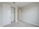 Neutral bedroom with carpet, large closet, and good lighting at 24177 W Hilton Ave, Buckeye, AZ 85326