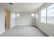 Bedroom with carpet and windows at 24177 W Hilton Ave, Buckeye, AZ 85326