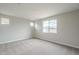 Bedroom with carpet and windows at 24177 W Hilton Ave, Buckeye, AZ 85326