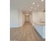 Bright living space with recessed lighting, granite counters, and light tile flooring at 31363 N 130Th Ave, Peoria, AZ 85383
