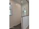 Elegant walk-in shower featuring custom wall tile, black trim and fixtures, and decorative tile floor at 31363 N 130Th Ave, Peoria, AZ 85383