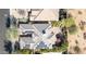 Aerial view of house featuring solar panels and a backyard patio at 3525 E Robin Ln, Phoenix, AZ 85050
