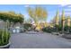 Outdoor kitchen and patio area with built-in grill and seating at 3525 E Robin Ln, Phoenix, AZ 85050