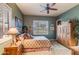 Comfortable bedroom with southwestern decor and built-in wooden cabinet at 3525 E Robin Ln, Phoenix, AZ 85050