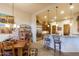 Charming dining area with rustic wooden table and chairs at 3525 E Robin Ln, Phoenix, AZ 85050