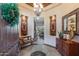 Elegant entryway with high ceilings, wood floors, and decorative accents at 3525 E Robin Ln, Phoenix, AZ 85050