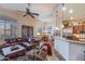 Open concept kitchen and living area with breakfast nook and island at 3525 E Robin Ln, Phoenix, AZ 85050