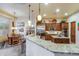 Modern kitchen with granite countertops, custom cabinetry and stainless steel appliances at 3525 E Robin Ln, Phoenix, AZ 85050