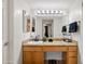 Bathroom with granite vanity and double sinks at 3825 E Camelback Rd # 290, Phoenix, AZ 85018