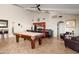 Community recreation room with pool table, kitchenette, and seating area at 3825 E Camelback Rd # 290, Phoenix, AZ 85018