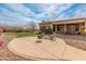 Spacious backyard with fire pit and patio area at 42034 N Harbour Town Ct, Anthem, AZ 85086