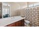 Bathroom with single vanity and shower at 42034 N Harbour Town Ct, Anthem, AZ 85086