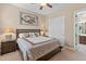 Bedroom with king-size bed and large closet at 42034 N Harbour Town Ct, Anthem, AZ 85086
