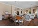 Elegant dining room with hardwood floors and large table at 42034 N Harbour Town Ct, Anthem, AZ 85086