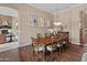 Formal dining room with wood table and chairs at 42034 N Harbour Town Ct, Anthem, AZ 85086