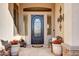 Ornate front door entry with decorative accents at 42034 N Harbour Town Ct, Anthem, AZ 85086