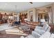 Open floor plan with kitchen and living area at 42034 N Harbour Town Ct, Anthem, AZ 85086