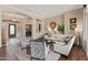 Open living room with hardwood floors and high ceilings at 42034 N Harbour Town Ct, Anthem, AZ 85086