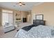 Spacious main bedroom with sitting area and large windows at 42034 N Harbour Town Ct, Anthem, AZ 85086
