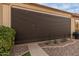 Covered patio with retractable shade screen at 42034 N Harbour Town Ct, Anthem, AZ 85086
