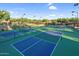 Well-lit pickleball courts perfect for outdoor recreation at 42034 N Harbour Town Ct, Anthem, AZ 85086