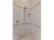 Clean shower with tile surround and built-in niche at 42034 N Harbour Town Ct, Anthem, AZ 85086