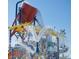 Fun water park with large dumping bucket and spray features at 42034 N Harbour Town Ct, Anthem, AZ 85086