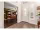 Entryway with tiled floor, built-in shelving, and interior door at 4293 S Columbine Way, Gold Canyon, AZ 85118