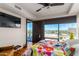 Bright bedroom with city views and access to a private balcony at 4422 N 75Th St # 7009, Scottsdale, AZ 85251