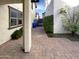 Private backyard with brick pavers and mature shrubs at 4738 E Tierra Buena Ln, Phoenix, AZ 85032