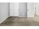 Well-lit bedroom featuring double door closet and neutral wall colors at 4738 E Tierra Buena Ln, Phoenix, AZ 85032