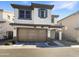 Two story home with attached garage and neutral color scheme at 4738 E Tierra Buena Ln, Phoenix, AZ 85032